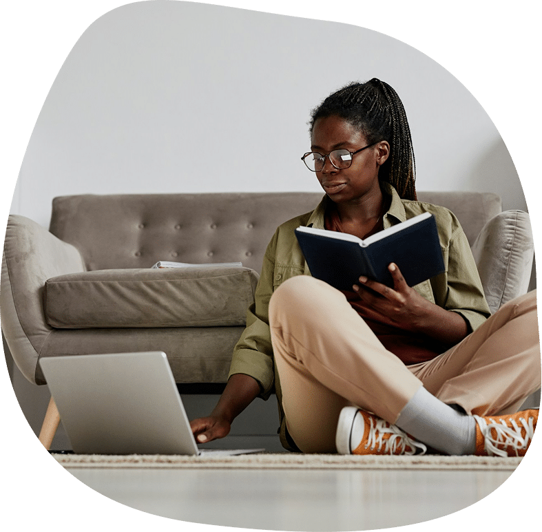 a young african american woman using laptop