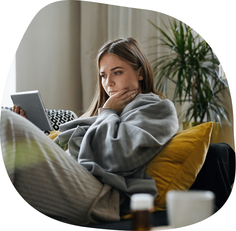 young woman looking at her tablet